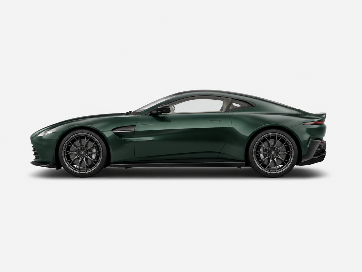Green Aston Martin sports coupe car