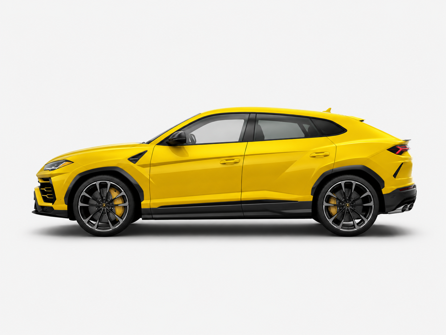 Yellow Lamborghini Urus SUV side view