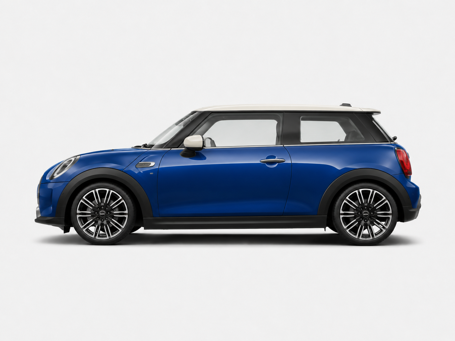 Blue MINI Cooper hatchback side view